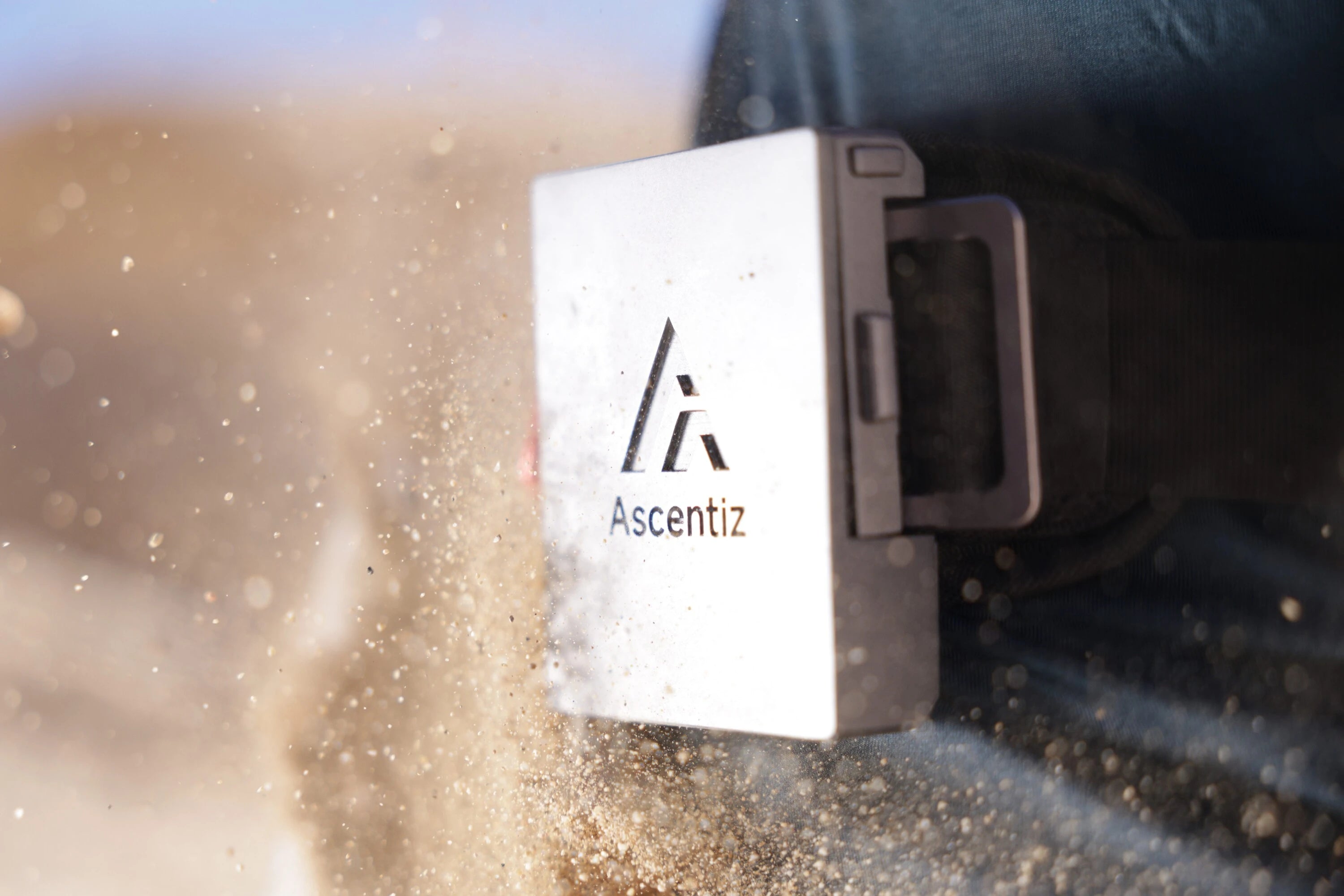 Sand splashing on motor panel of exoskeleton belt