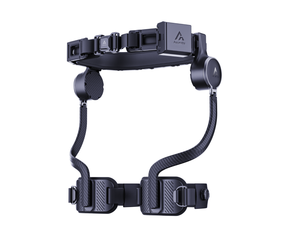 Full studio view of the Ascentiz H Ultra exoskeleton showcasing the waist belt, side mechanical joints, and lightweight carbon fiber leg support frames with thigh cuffs.