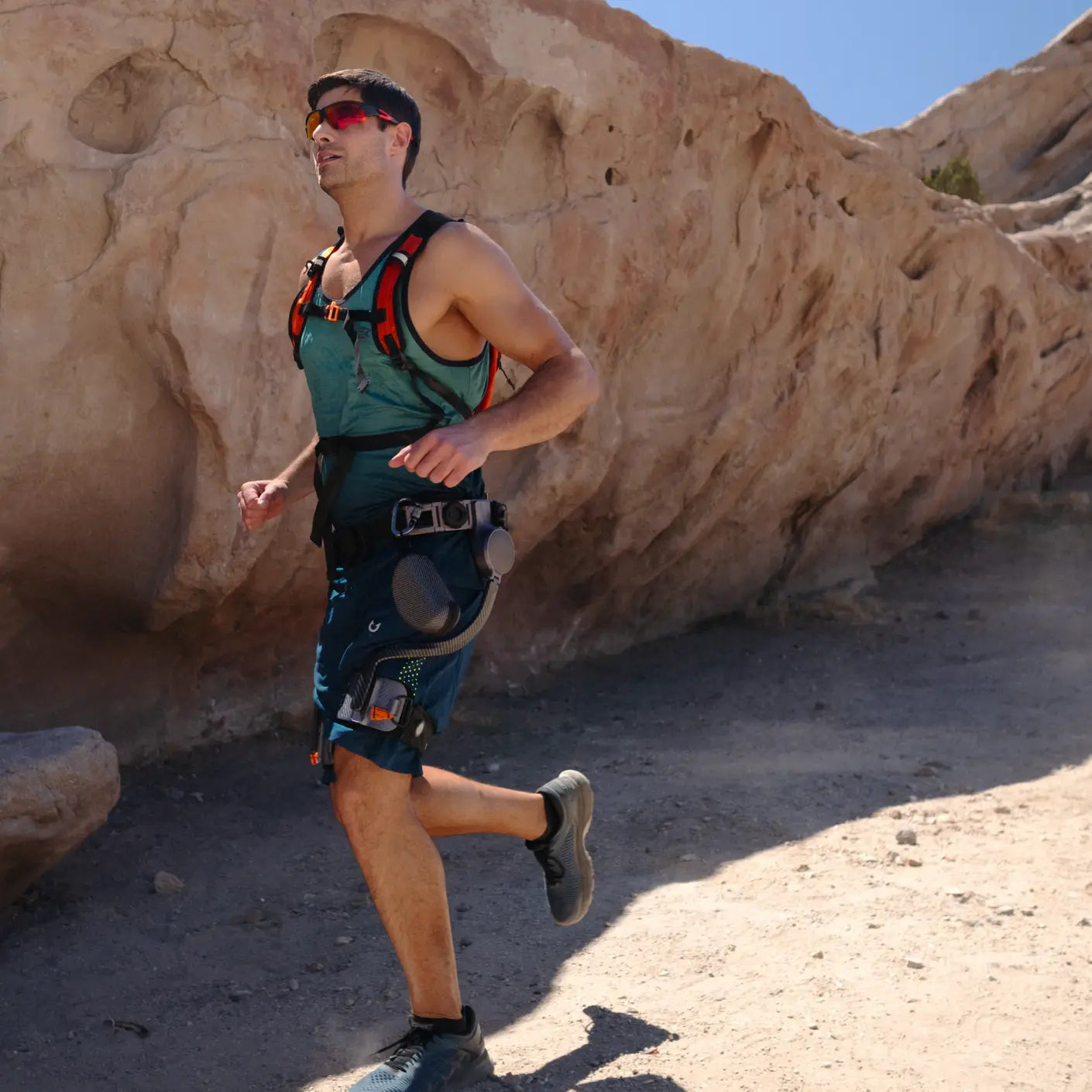 Man wearing Ascentiz exoskeleton running downhills