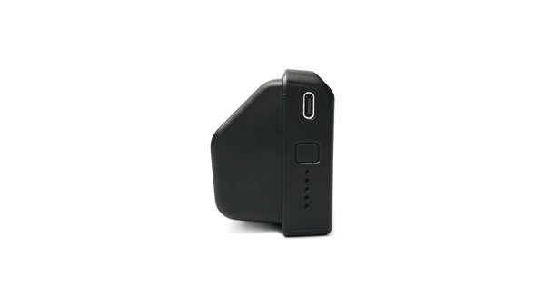 Detailed studio view of the Ascentiz exoskeleton intelligent battery pack, showcasing the Type-C charging port and LED battery indicator lights on the side panel.